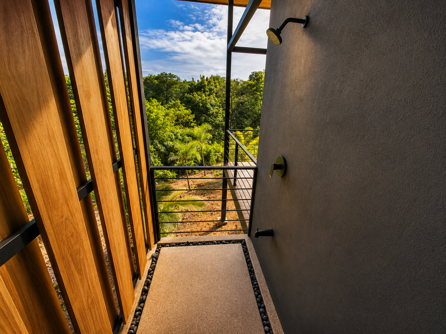 Private outdoor shower screened by teak slats with jungle views